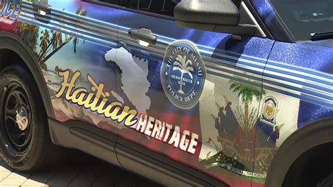 Miami PD unveil newly wrapped Haitian Heritage vehicle to celebrate Haitian Heritage Month